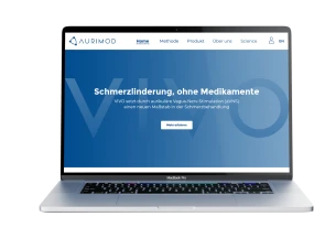Laptop mit Ansicht der Website von Aurimod, die eine innovative Methode zur medikamentenfreien Schmerzlinderung mittels aurikulaerer Vagus-Nerv-Stimulation (aVNS) praesentiert