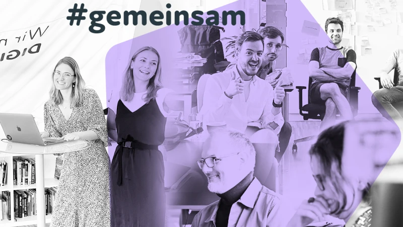 Lachende Teammitglieder mit Spirit Hashtag gemeinsam