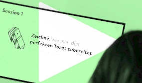 Präsentationsfolie mit dem Titel Session 1 und der Aufgabe 