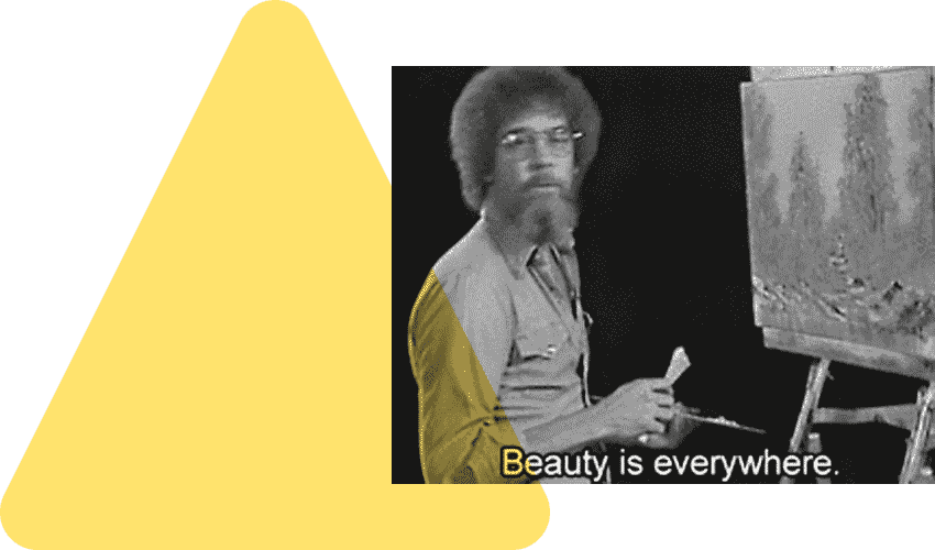 Gif Mann mit lockigem Haar und Bart (Bob Ross) malt auf Leinwand, darunter steht Beauty is everywhere