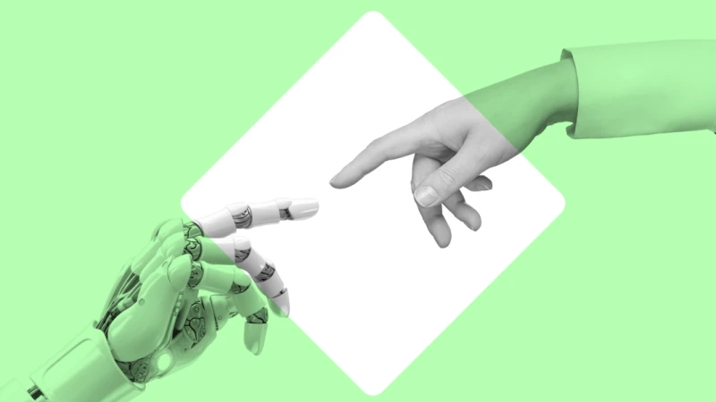 Roboterhand und menschliche Hand greifen zueinander